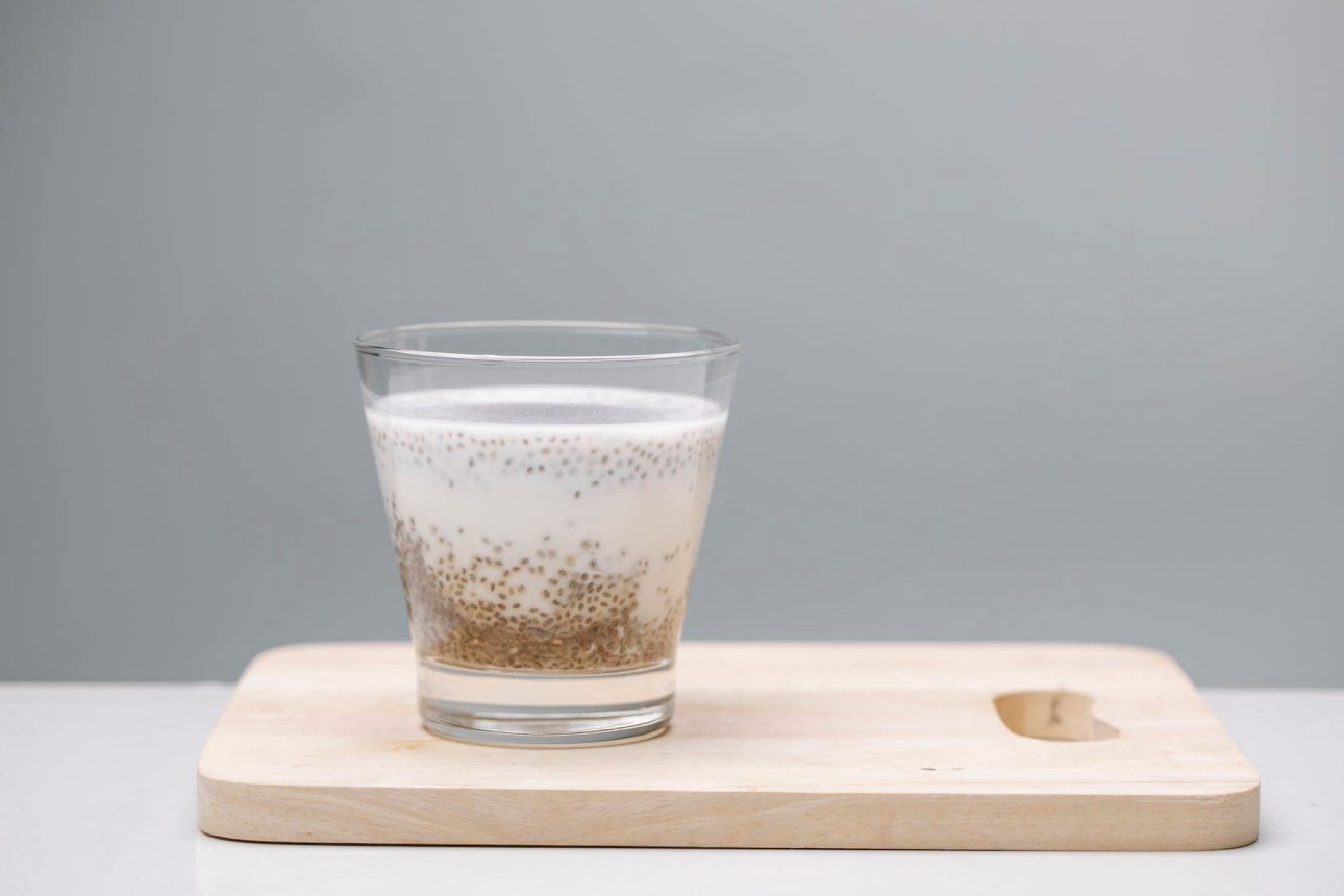 A glass of tasty pudding with chia seeds.