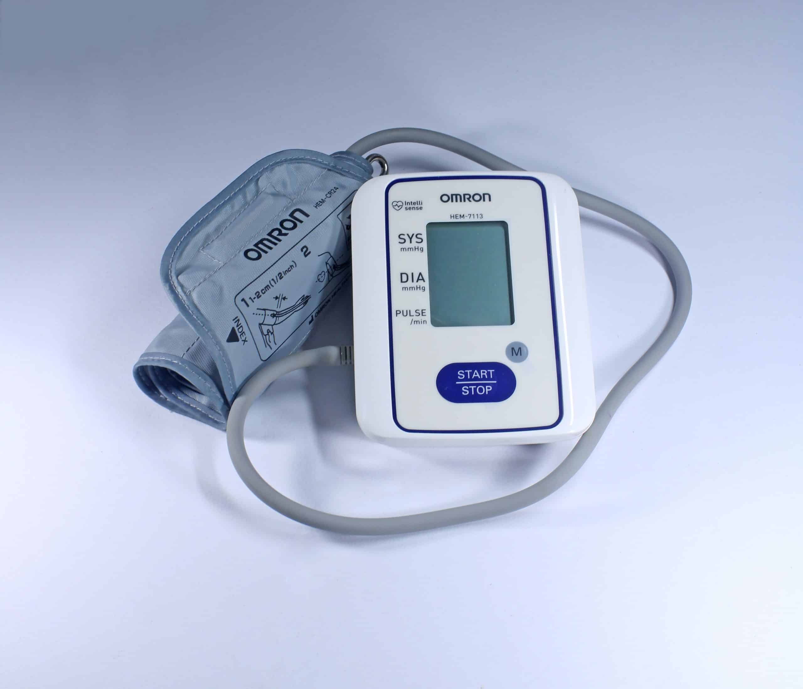 omron brand blood pressure monitor with cuff